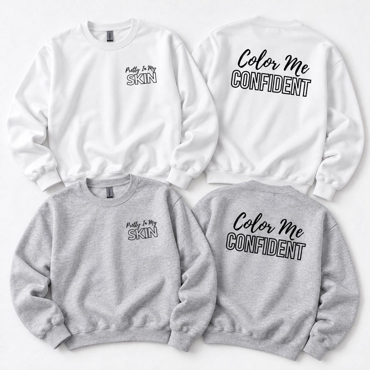White and ash grey Color Me Confident crewnecks, front and back, flat lay