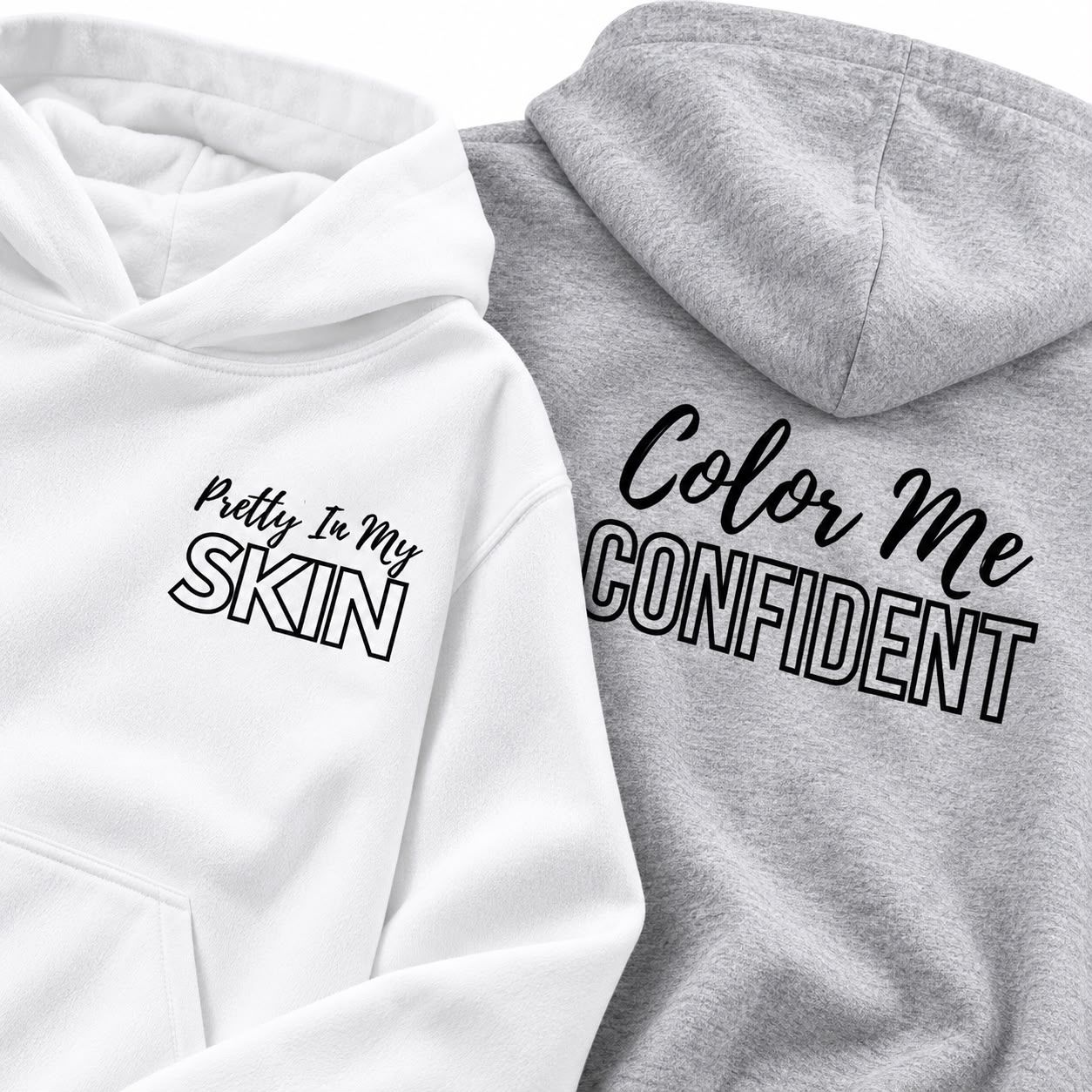 White Color Me Confident hoodie front and ash grey hoodie back, flat lay